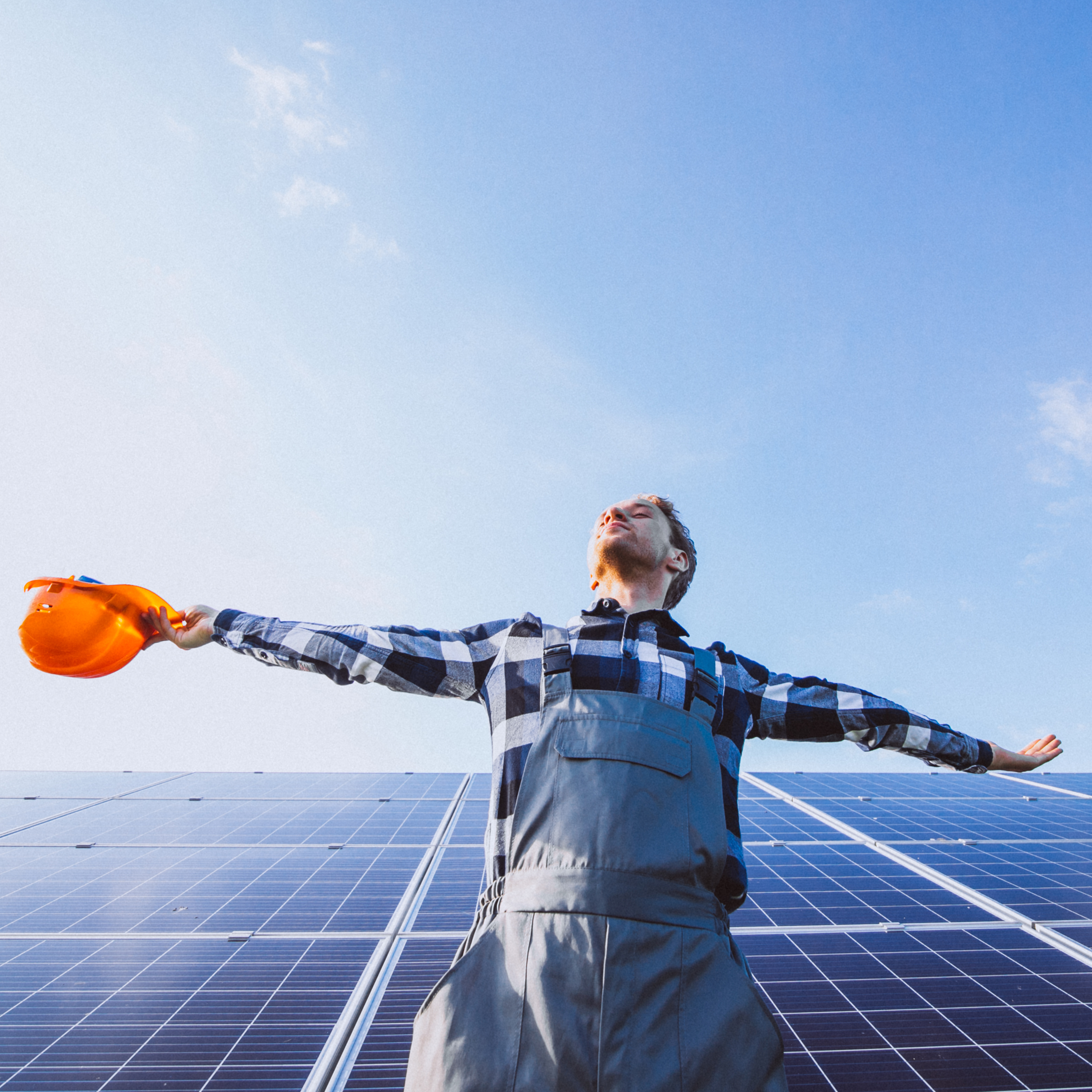 man-worker-in-the-firld-by-the-solar-panels